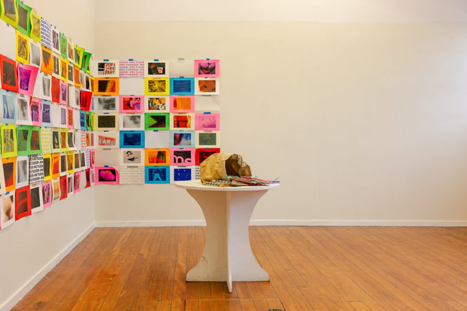 Colourful art on a gallery wall.