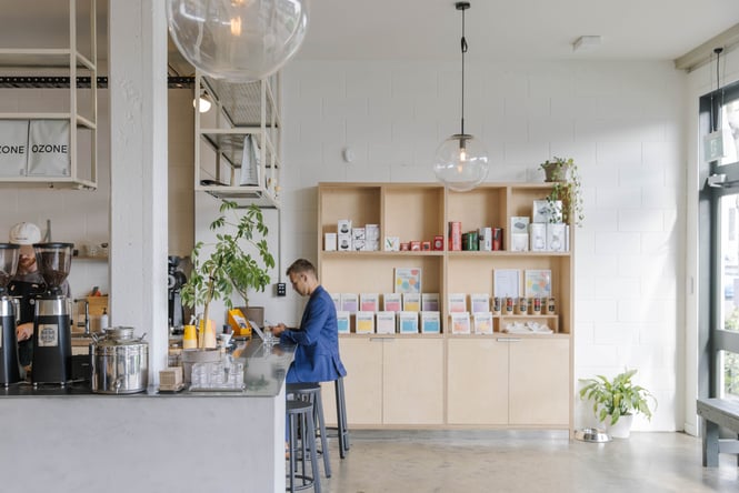 Man working at Ozone Coffee.