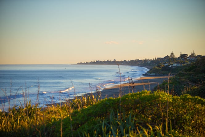 A beach at sunset.