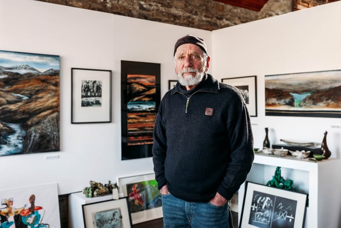 A man looking to camera.