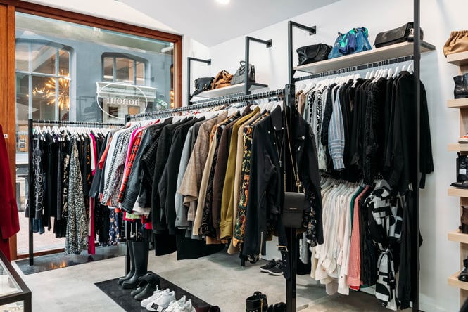 Clothes are displayed on racks at Honour.