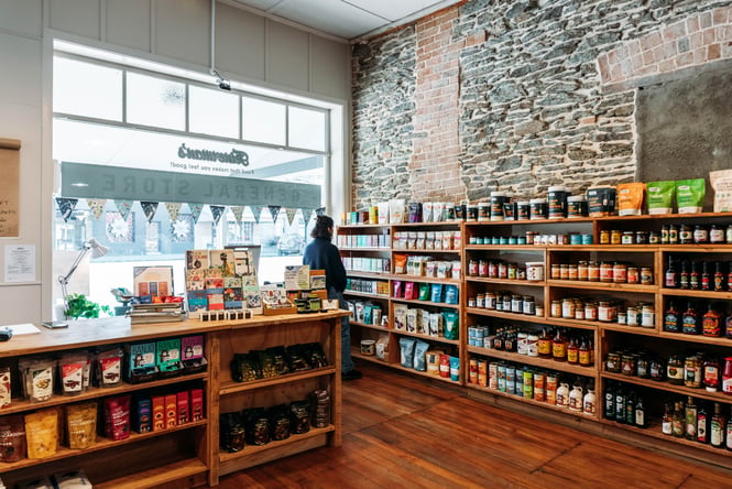Customer browsing the shelves at Feinerman's General Store.