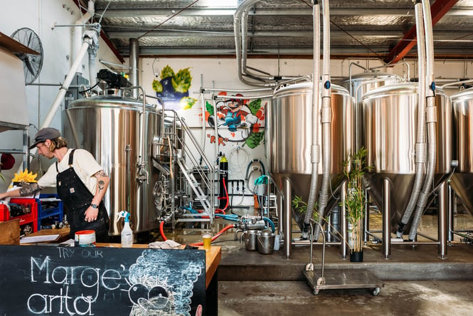 A man making beer.