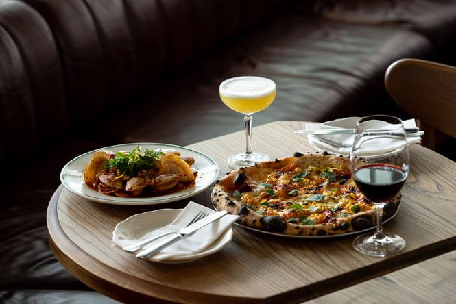 Pizza on a table at Lilian restaurant in Auckland.