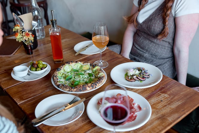 Pizza on table at OOH-Fa in Auckland