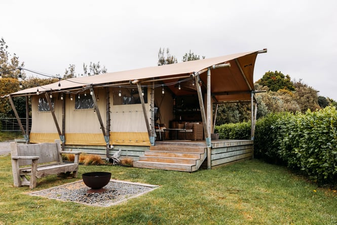 Building exterior of the glamping hut at Te Hāpua Coastal Glamping