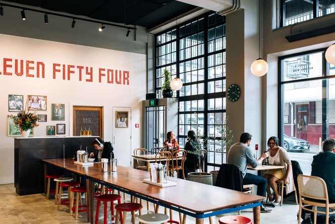 People dining inside 1154 in Wellington.