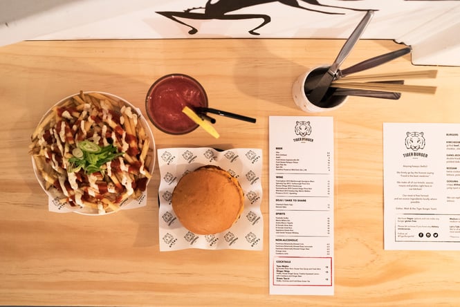 A flatlay of burger and chips.