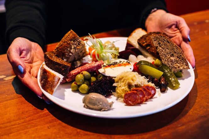 Plate of food being served at Topor.