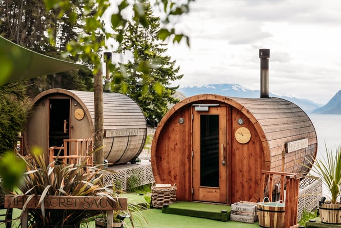 Wooden saunas beside the lake.