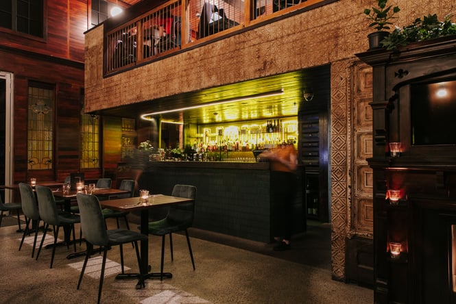 The dimly lit bar area inside Soul Quarter.
