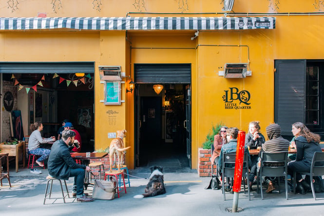 Customers sitting outside Little Beer Quarter on Edward Street.