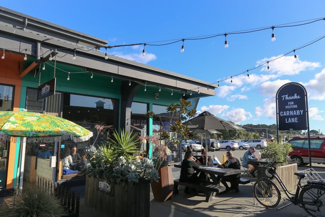 Outdoor area with umbrellas at Switch New Brighton