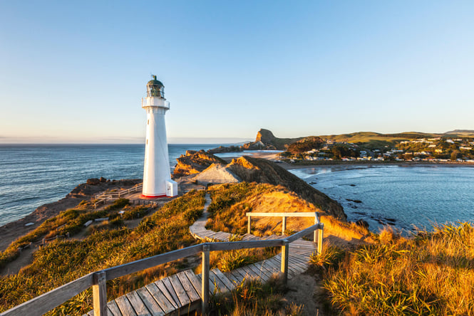 A lighthouse at Castlepoint on a sunny day.