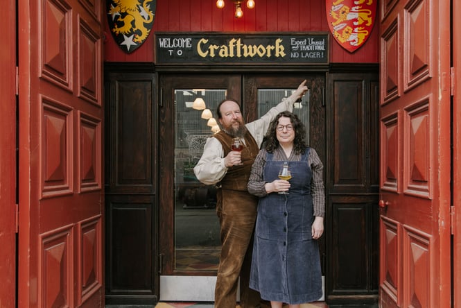 Lee-Ann and Michael from Craftwork Brewery smiling to camera.