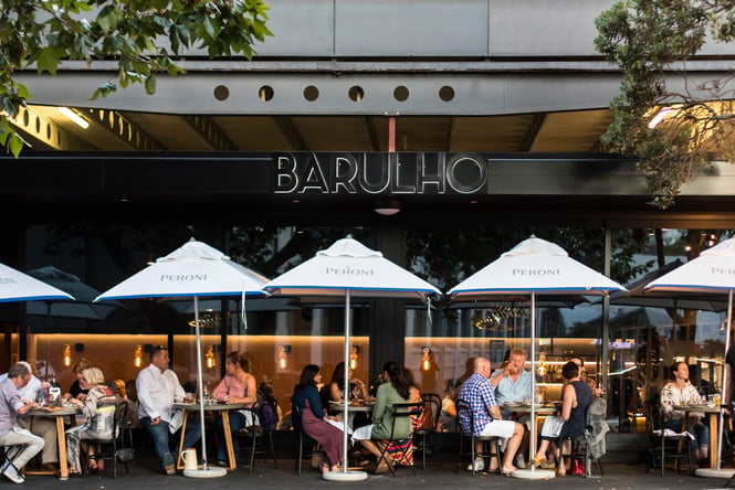 People dining outside Barulho.