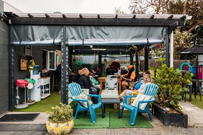 Rustic cafe backyard with beach vibes