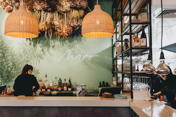 A staff member working behind the bar at Miro.