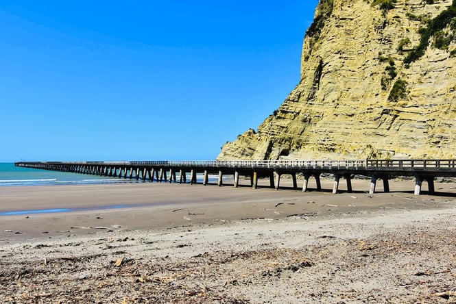 The Tolaga Bay Wharf on a clear sunny day.