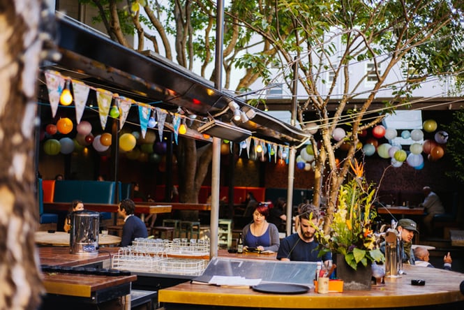People dining outside at Southern Cross in Wellington.