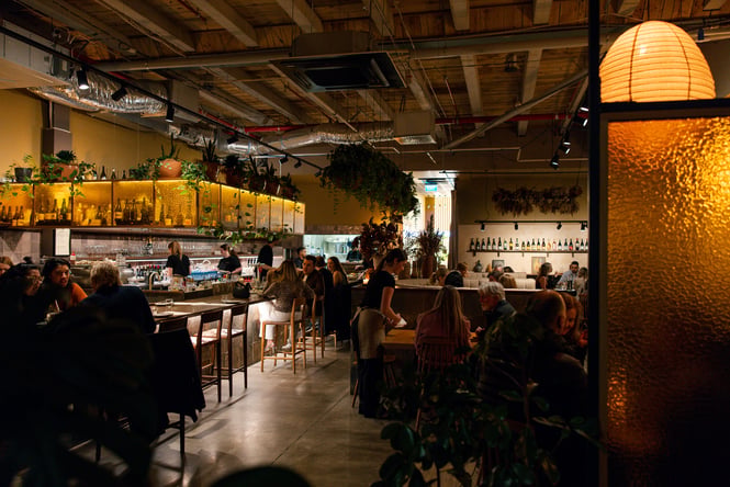 Odeon's low-lit dining space full of people having dinner