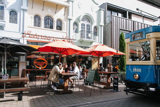 A group of people eating gelato outside Rollickin' in Christchurch.