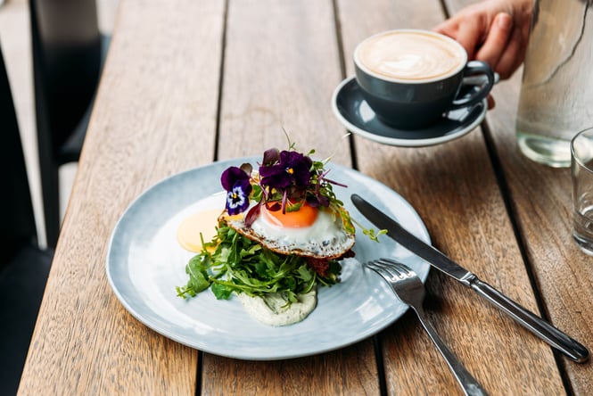 Egg dish and coffee on the table.
