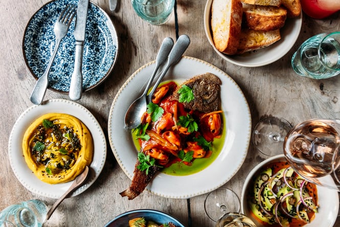 Flat lay of food dishes on a table.