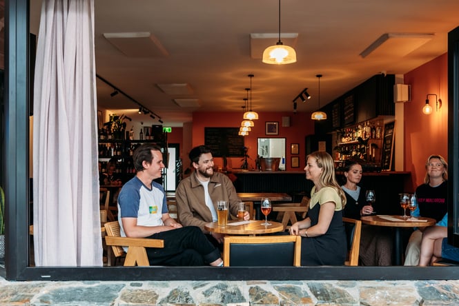 A table of customers sitting at a table at Verve.