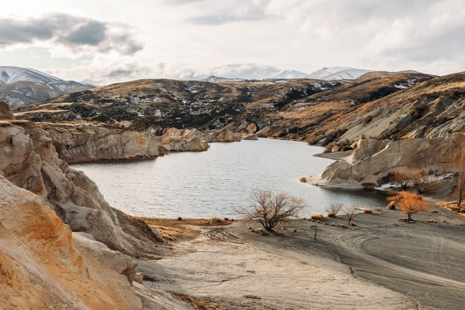 The blue lake looking very grey in Central Otago.