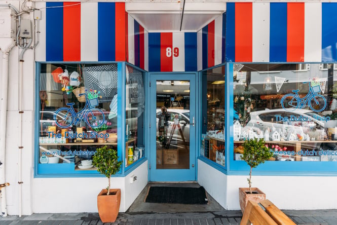 The red, blue and white exterior of The Dutch Shop.