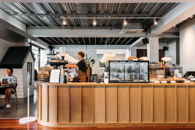 A beautiful wooden cafe counter inside Twenty Eight cafe.