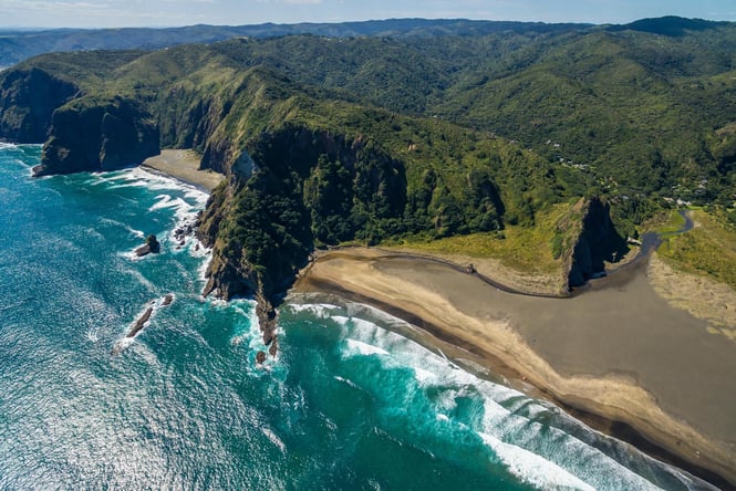Karekare Beach on a sunny day.