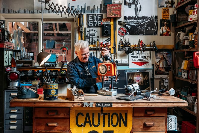 Owner Martin working on a robot in his studio at BuggyRobot Gallery in Ōamaru.
