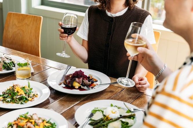 Diners enjoying a meal at Riverstone Kitchen in Ōamaru.