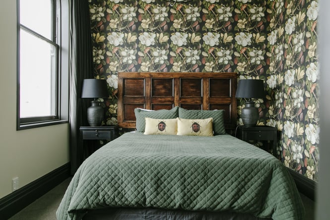 Pretty wallpapered room at The Old Confectionery in Ōamaru.