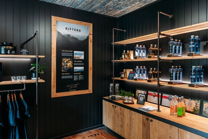 Bottles of gin on the shelf at Rifters Tasting Room.