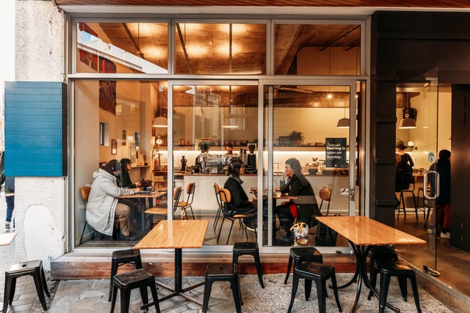 People dining inside a cafe.