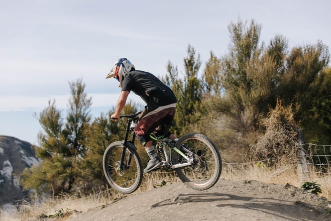A mountain biker on a bike track.
