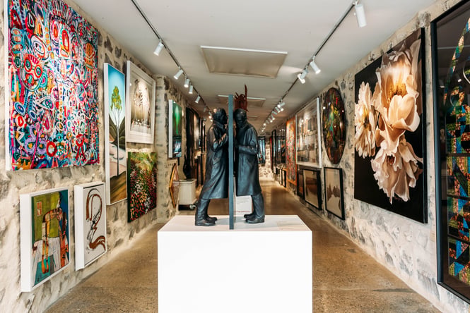 The busy interior of ArtBay gallery in Queenstown.