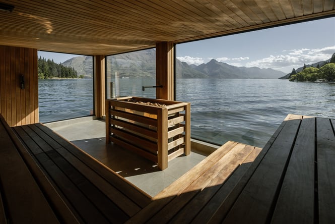 A sauna on a lake's edge.