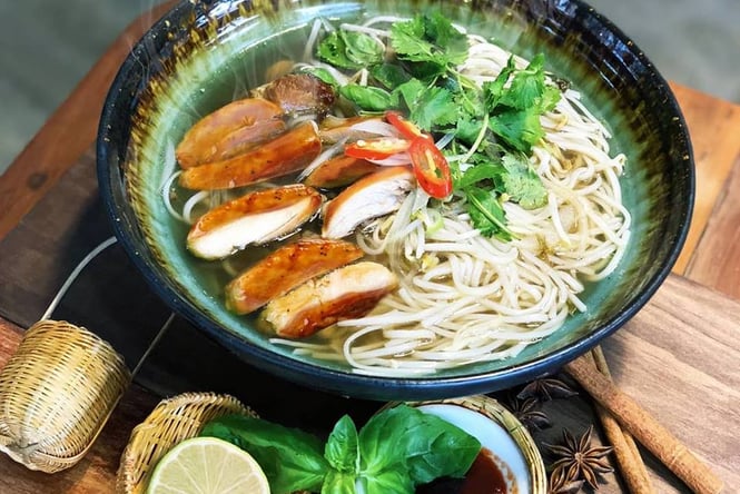 Pho Noodle soup on a table.