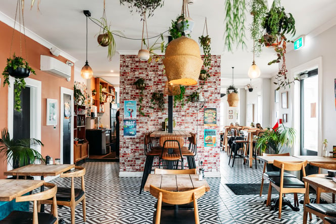 Inside a colourful looking cafe.