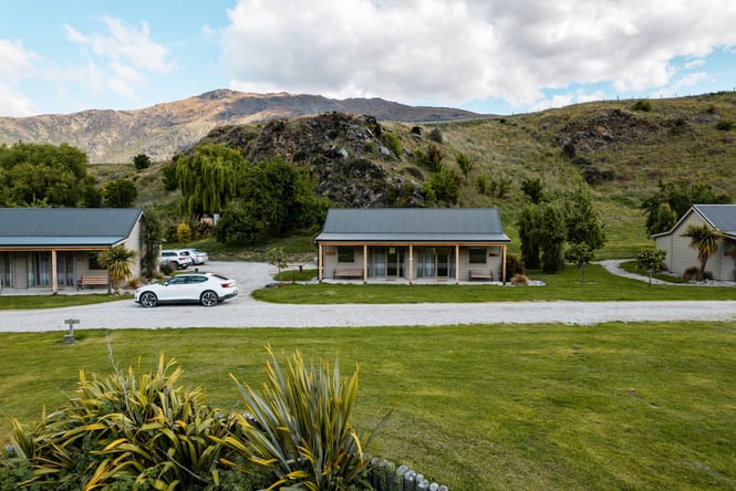 Huts on on grass in Queenstown.