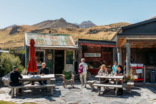 People dining outside Mrs Woolly's in Arrowtown.