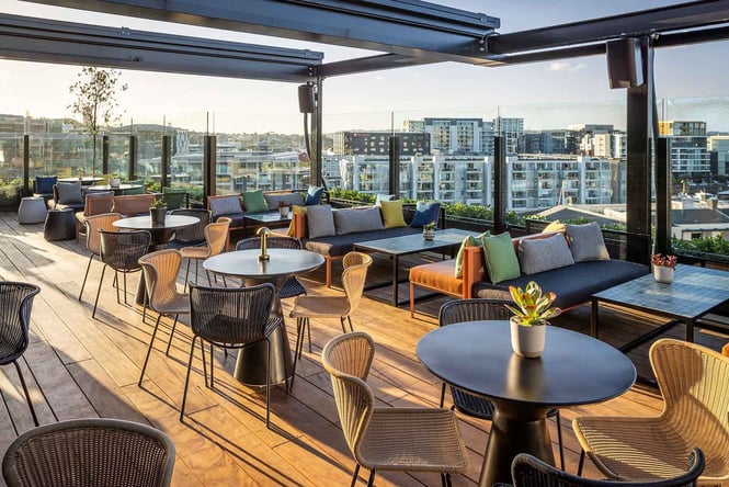 Looking across the tables over Auckland city.
