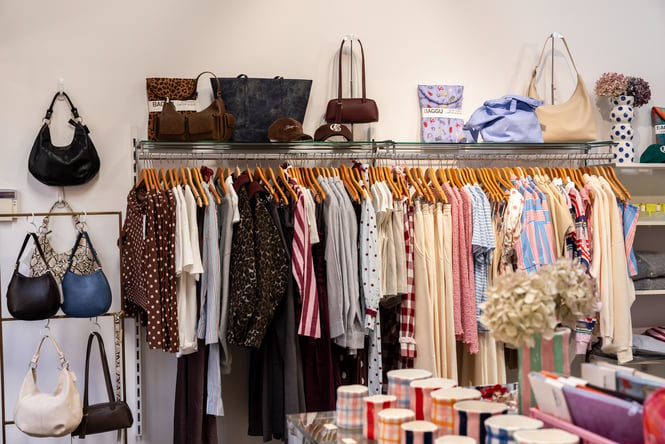 A rack of clothing in Uncommon.