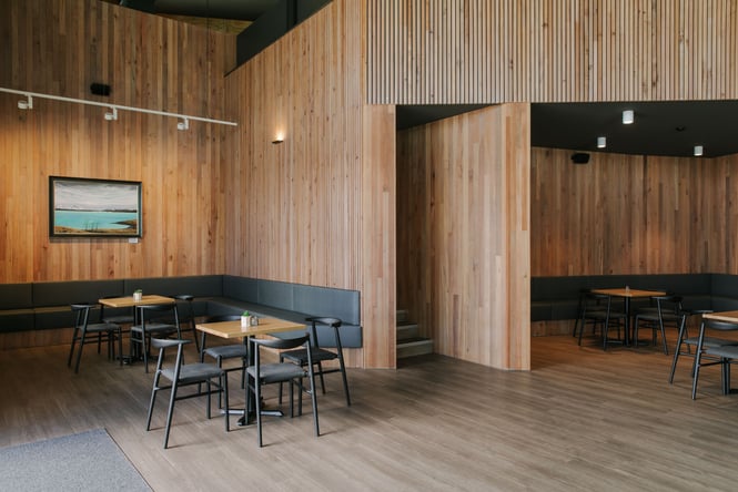 The wooden interior of the Opuke cafe.