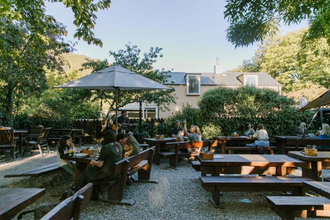 People sitting outside at Fork and Tap.