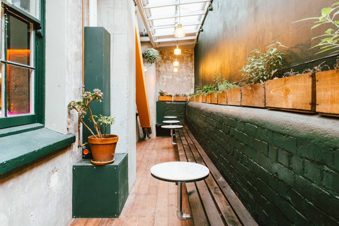 An outdoor seating area at Puffin Wine Bar.